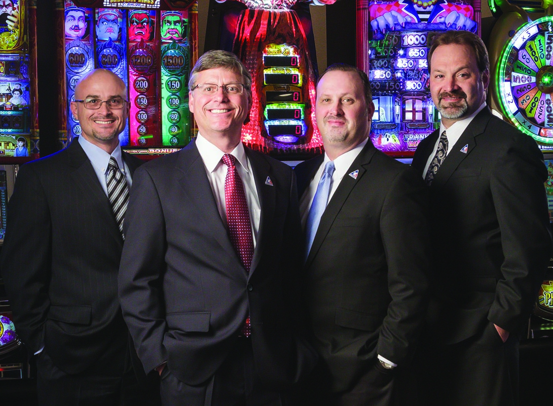 Pictured from left are Rob Ziems, executive vice president and general counsel; CEO Richard Pennington; Kelcey Allison, senior vice president of sales and marketing; and Paul Omohundro, director of marketing, Americas.